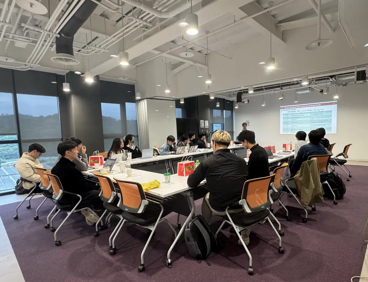 Researchers from NTU and Kyushu University in session around the seminar table at NCREE
