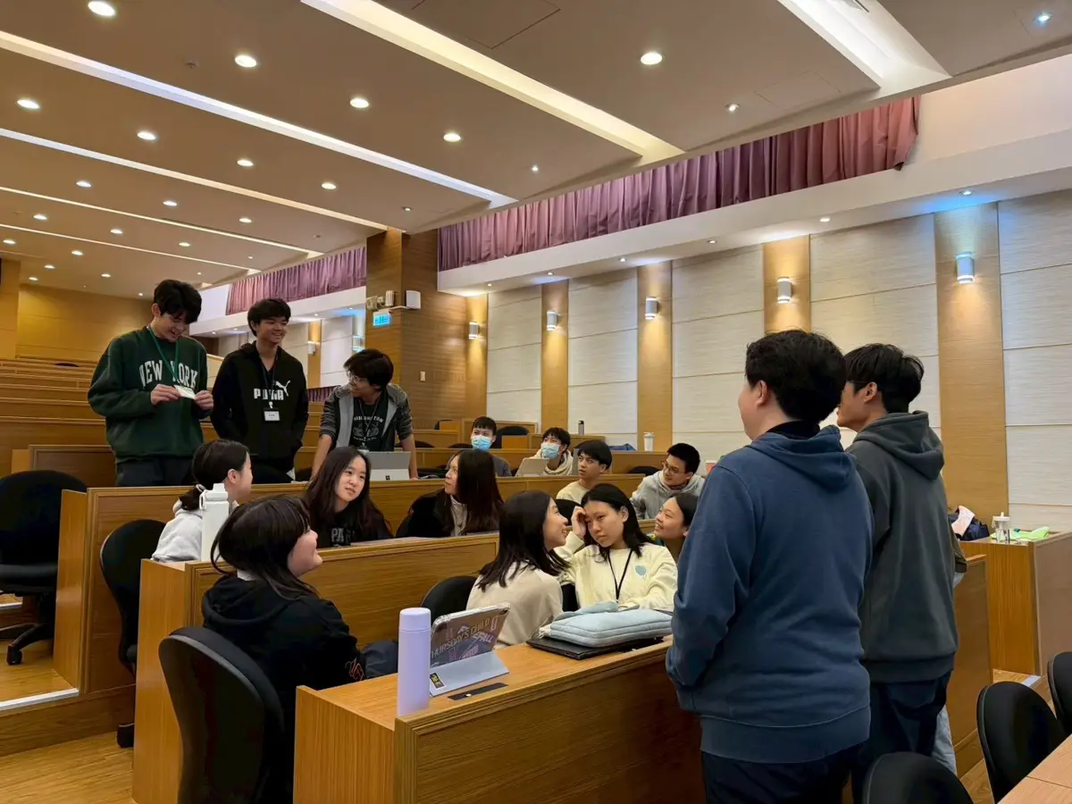 TAs and Students having discussions